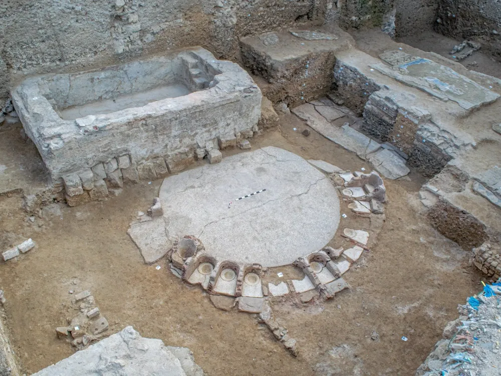 a dirt pit with archaeological remains