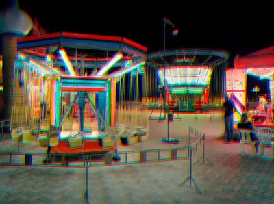A blurry image of an amusement park.