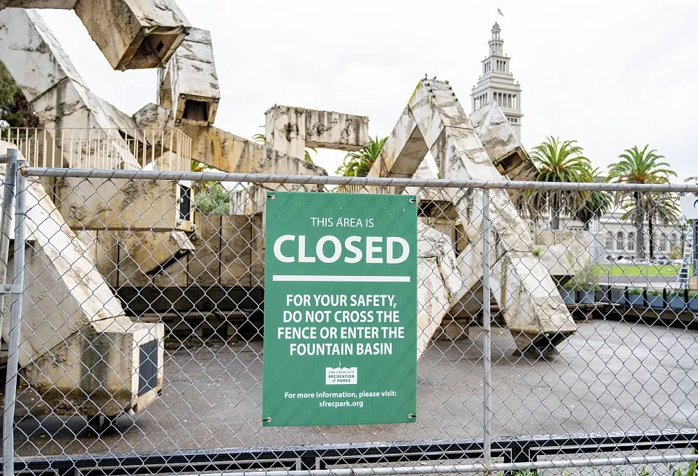 Vaillancourt Fountain with prominent Closed sign on construction fence, San Francisco, California, November 20, 2025. (Photo by Smith Collection/Gado/Getty Images)