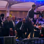 WASHINGTON, DC - APRIL 25: Health and Human Services Secretary Robert F. Kennedy Jr. (3rd-L) is taken out of the ballroom by security agents during a shooting incident at the annual White House Correspondents Association Dinner at the Washington Hilton on April 25, 2026 in Washington, DC. According to reports, President Donald Trump, along with other government officials, were evacuated from the Washington Hilton gun shots. (Photo by Andrew Harnik/Getty Images)