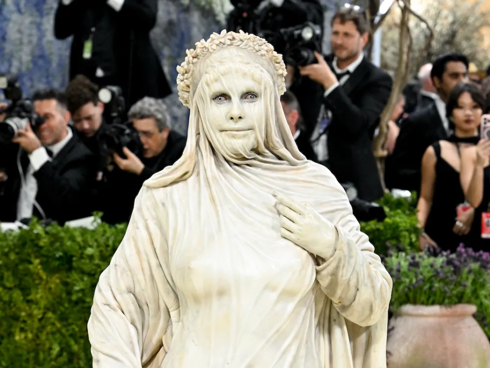 A woman dressed as a sculpture.