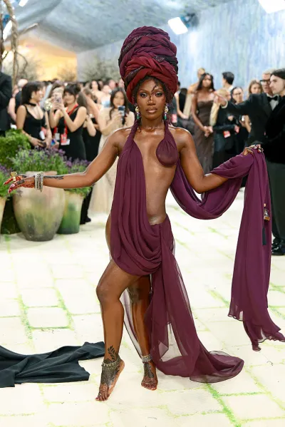 NEW YORK, NEW YORK - MAY 04: (EDITOR’S NOTE: Image contains partial nudity.) Doechii attends the 2026 Met Gala celebrating 