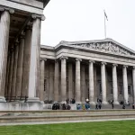 A photo shows the classical-style building of the British Museum, in London