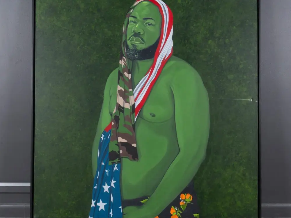 A painting of a man in green with an American flag and camouflage cloth hanging around his head.