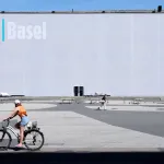 A bicyclist stops to look at the