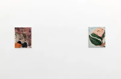 A painting of a rose next to a painting of two people kissing.