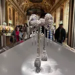 PARIS, FRANCE - OCTOBER 21: Sets of sumptuous jewelry, including crown, and large bodice bow of Empress Eugénie, are on display at the Louvre Museum on October 21, 2023 in Paris, France. The Louvre reopened its doors to visitors in Paris on October 22, 2025, the museum said on its website, three days after thieves stole jewels worth around €88 million (2 million) in a daring daytime heist. (Photo by Zhang Mingming/VCG via Getty Images)