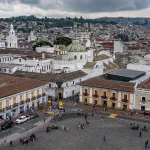 View of the city of Quito from the bell tower of the San Francisco Church in Quito, Ecuador. At left is the bell tower of the Metropolitan Cathedral, with the domes of the Church of the Society of Jesus at center. (Photo by: Jon G. Fuller / VWPics/ Universal Images Group via Getty Images)