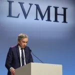 A man behind a rostrum.