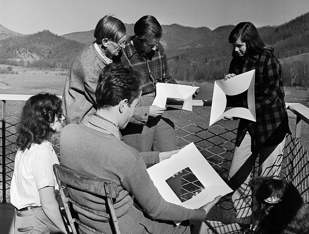An art class meets on a deck at Black Mountain College, an art and design school in Black Mountain, North Carolina. Today the former school is a museum and art center. (Photo by Genevieve Naylor/Corbis via Getty Images)