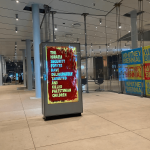 A light-up display that has been covered with text reading