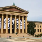 The facade of the Philadelphia Art Museum, showing off its new name and logo.