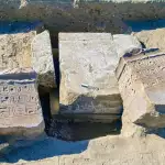 two large pieces of stone with inscriptions