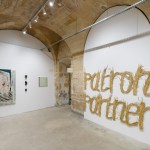 An exhibition at Post-Fair under the vaulted, 17th-century ceiling of a hotel particulier in Paris.