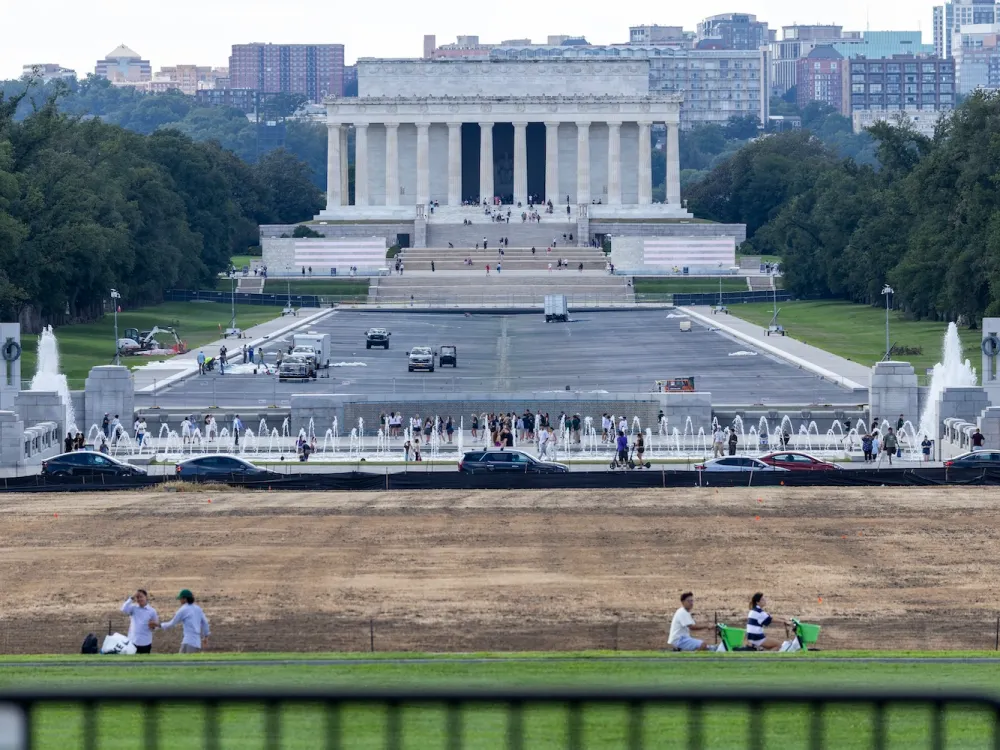 An empty reflecting pool in front of the Lincoln Memorial.