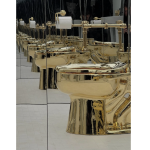 Many golden toilets.